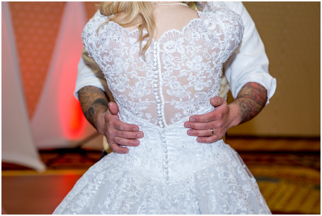 Red and Gold Cheyenne, Wyoming Wedding at Little America by Wyoming Photographer