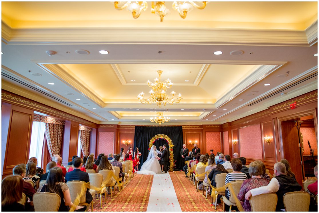 Red and Gold Cheyenne, Wyoming Wedding at Little America by Wyoming Photographer