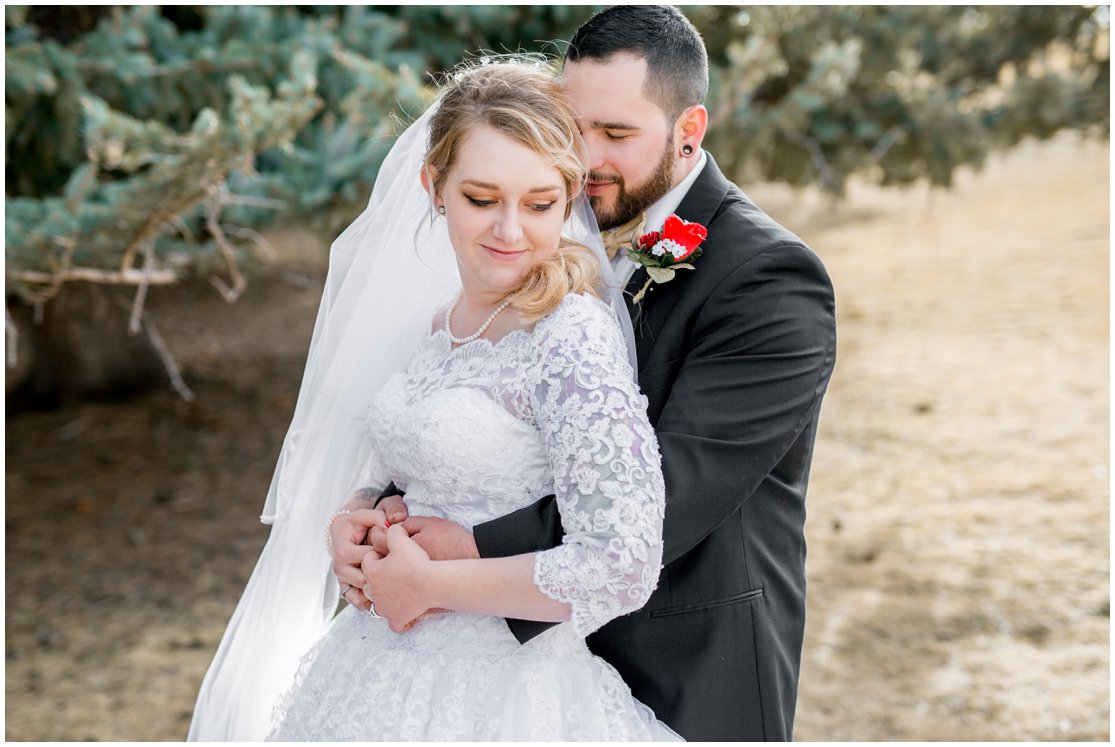 Red and Gold Cheyenne, Wyoming Wedding at Little America by Wyoming Photographer