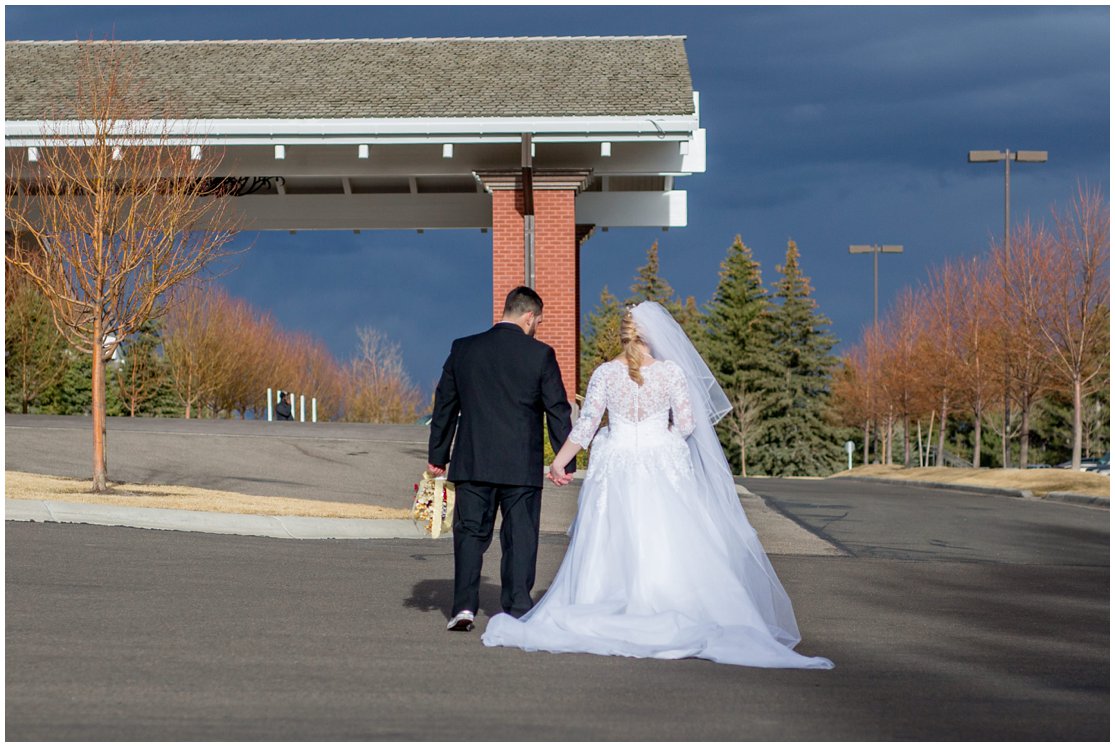 Red and Gold Cheyenne, Wyoming Wedding at Little America by Wyoming Photographer