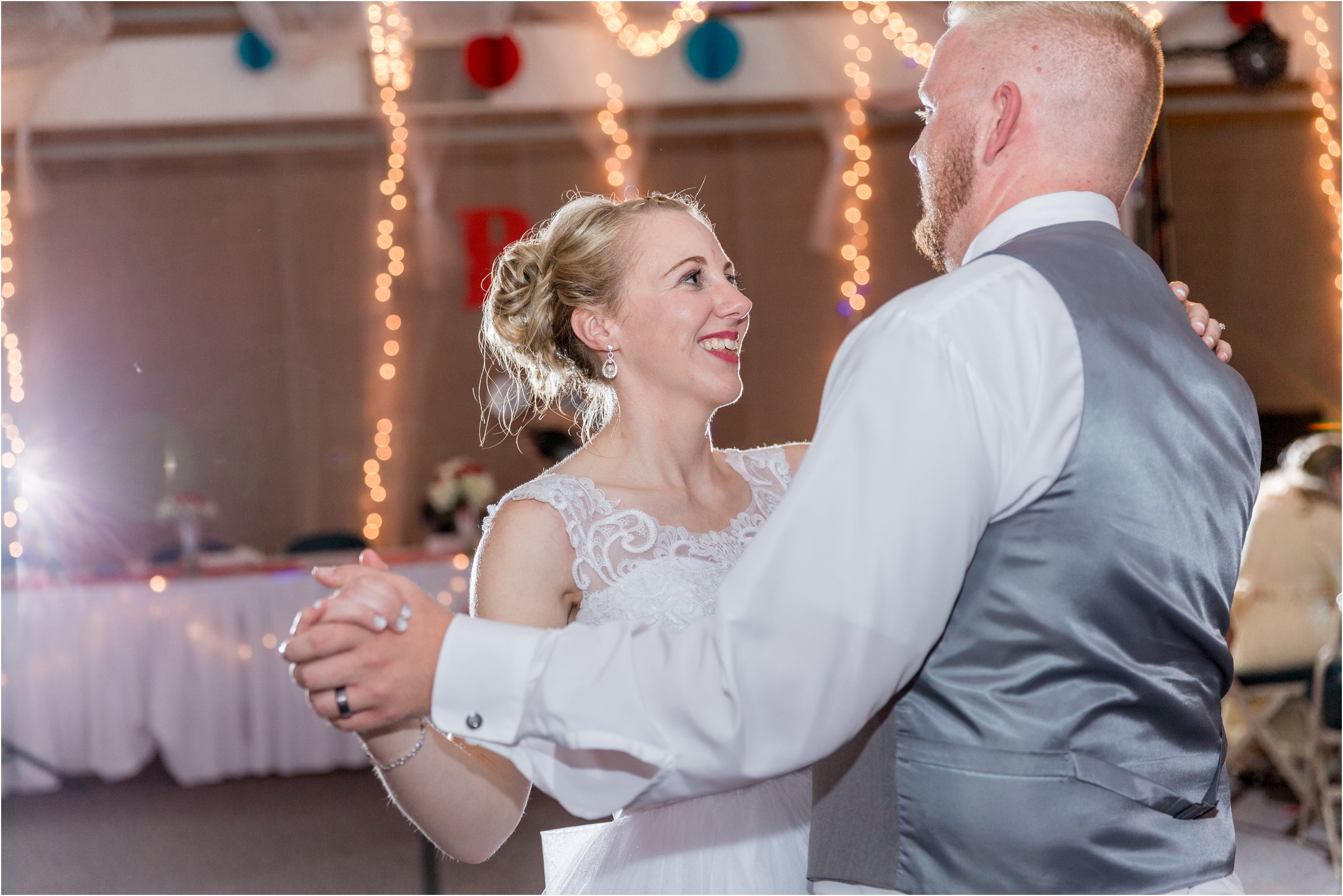 bride and groom dance together at their wedding reception in cheyenne