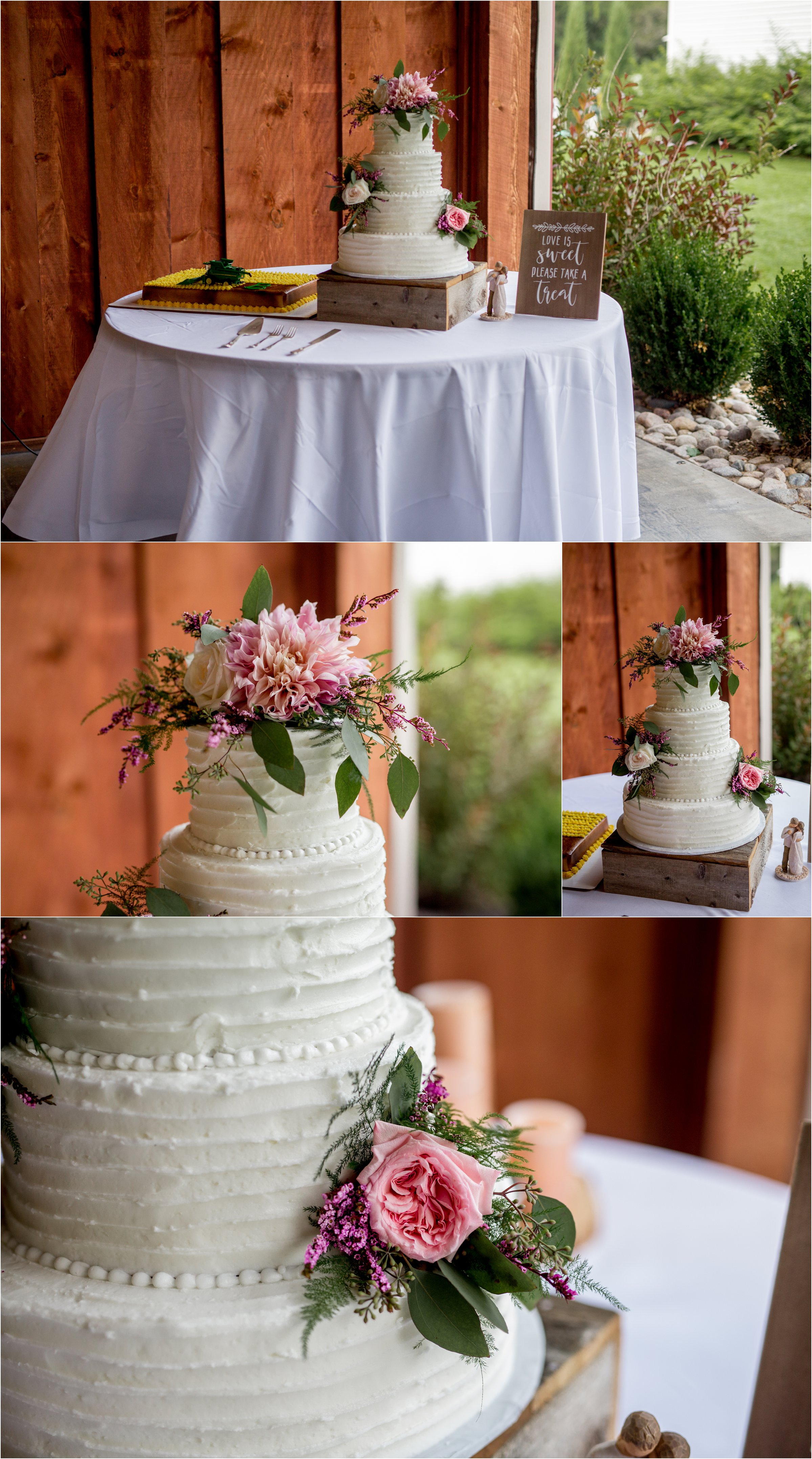 a wedding cake on a wooden blick with flowers on top and on sides