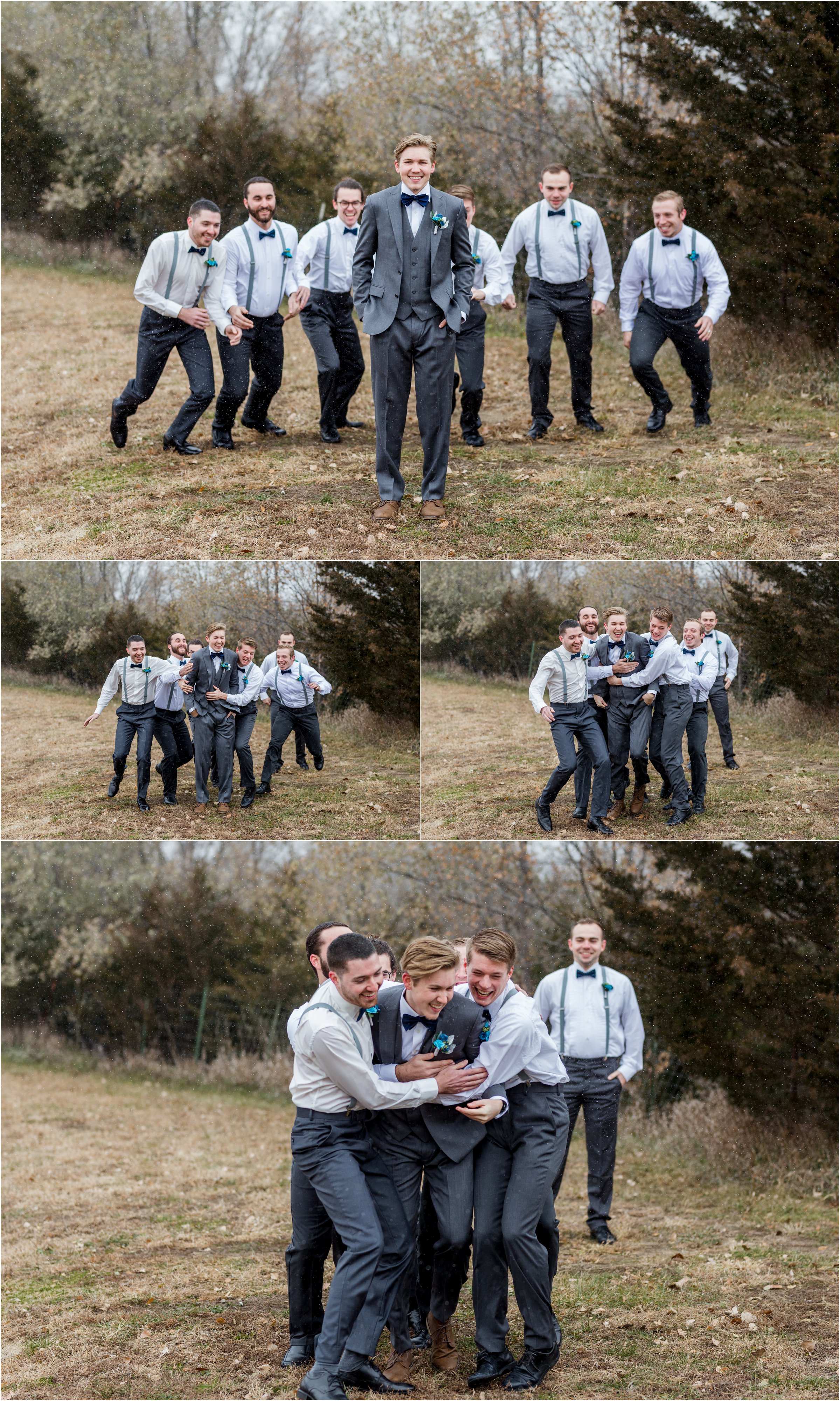 groom and groomsmen pose for portraits outside in front of evergreen trees with snow starting to fall