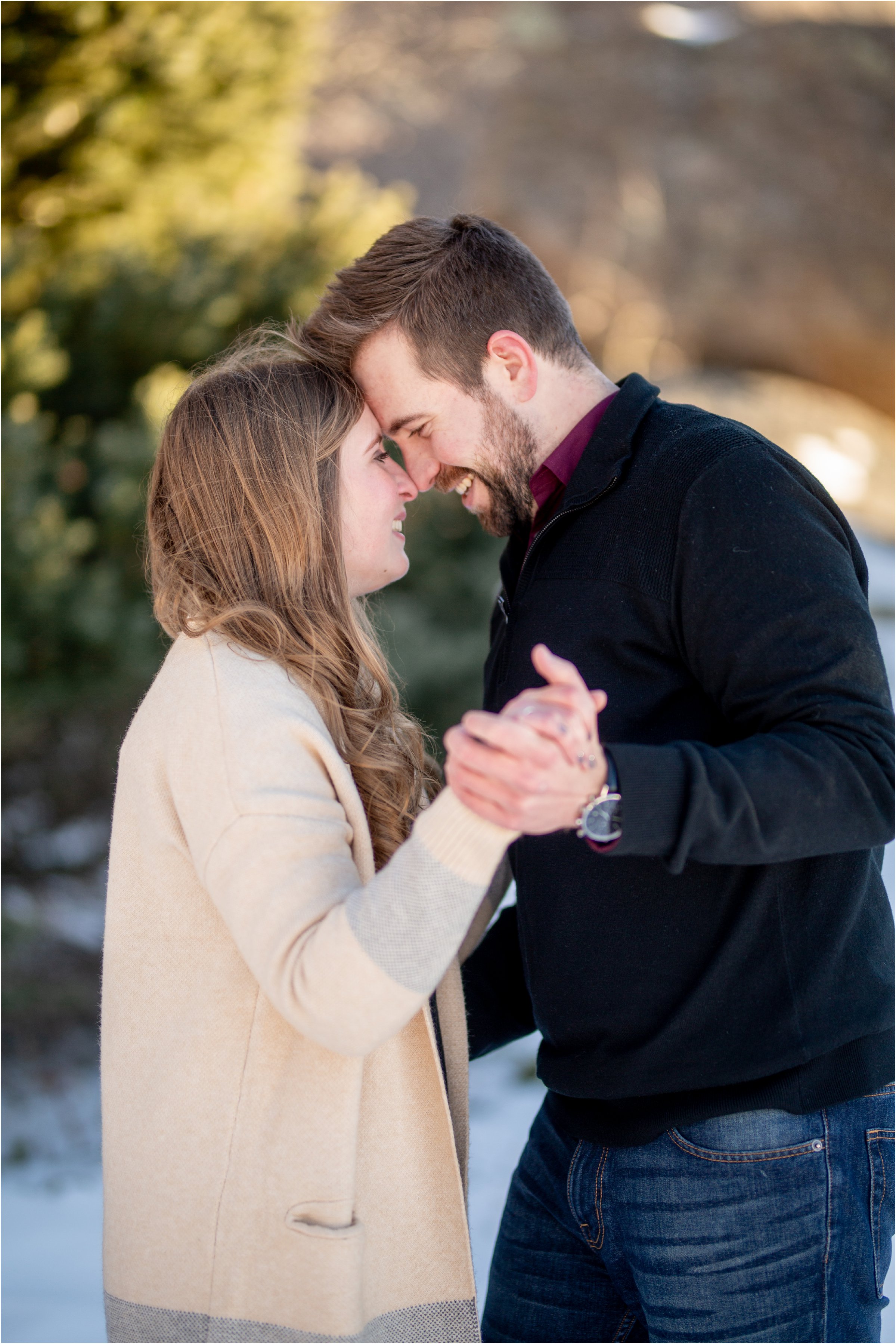 engaged couple dancing with foreheads together in their cheyenne engagement session