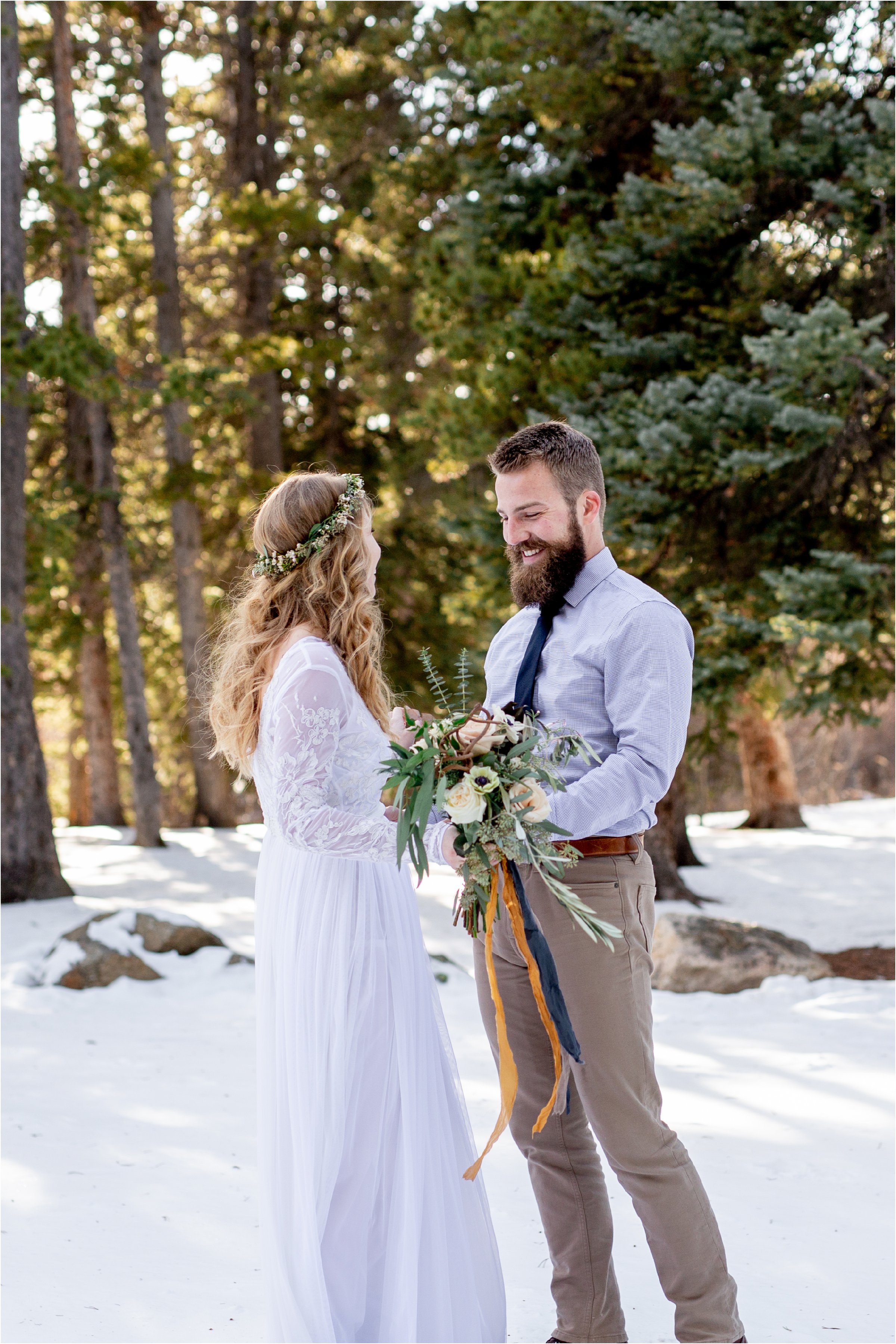 Groom seeing bride for the first time in mountain elopement