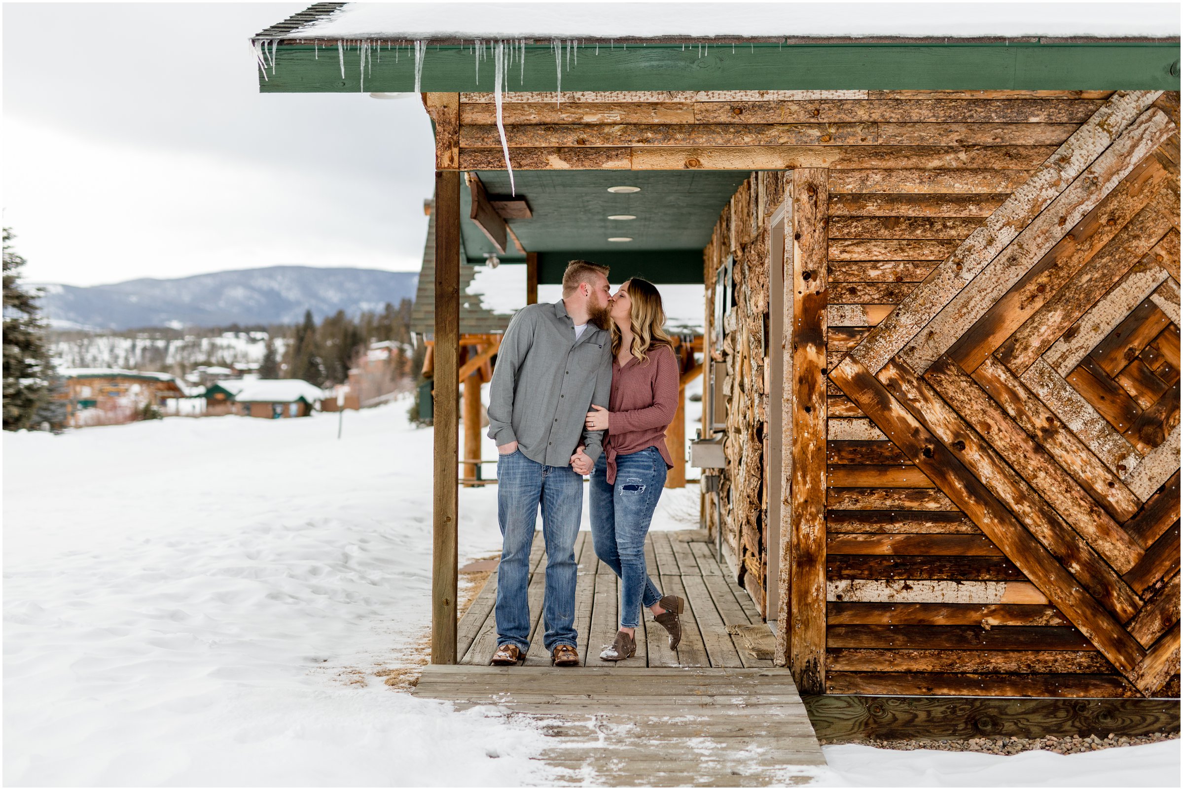 bride and groom in front of a building in grand lake with their grand lake wedding photographer