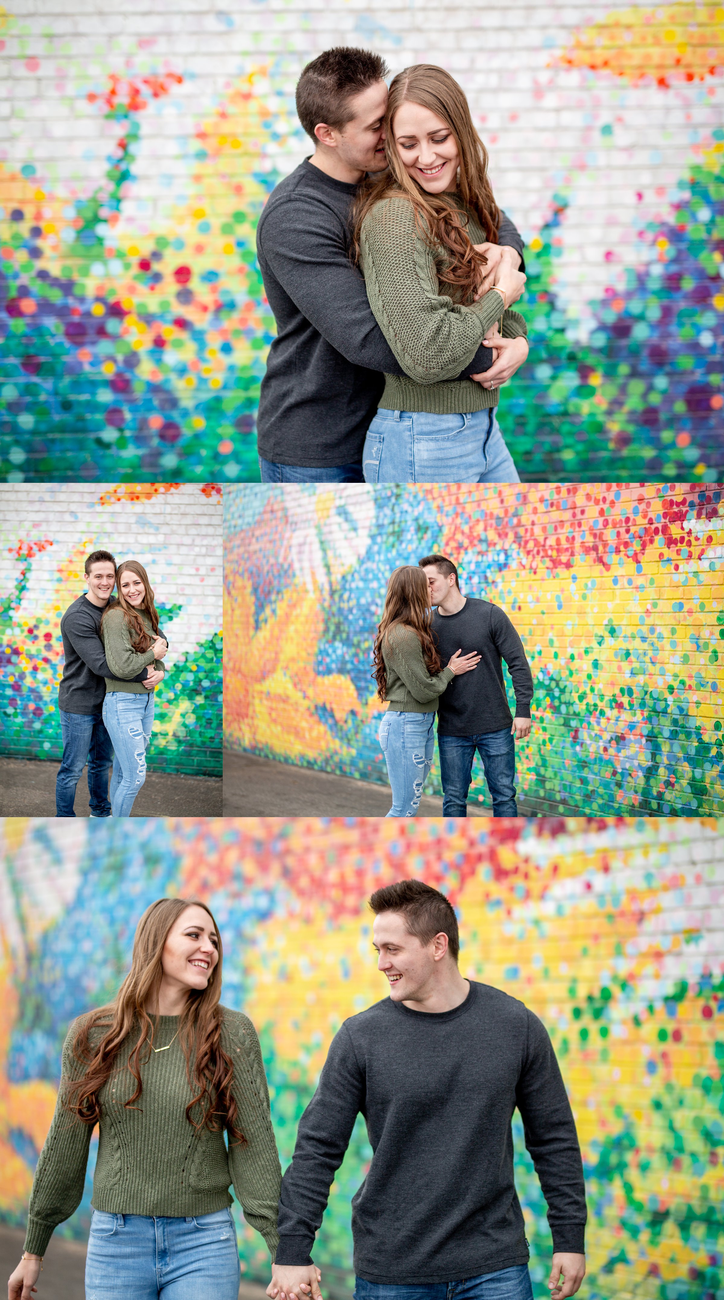 Engaged couple in front of colorful greeley wall for their fort collins engagement session