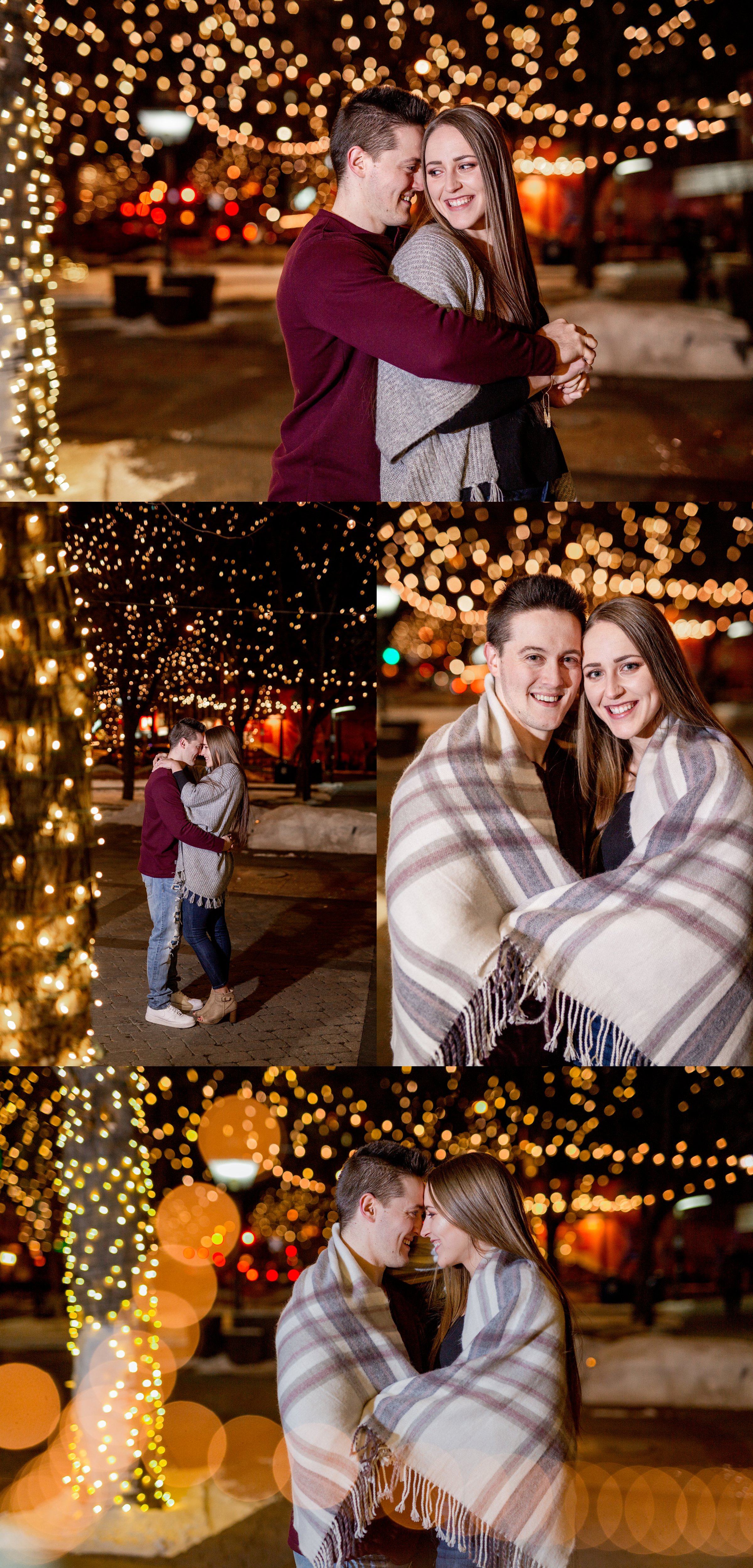 Engaged couple in downtown fort collins lights at night snuggling in a blanket