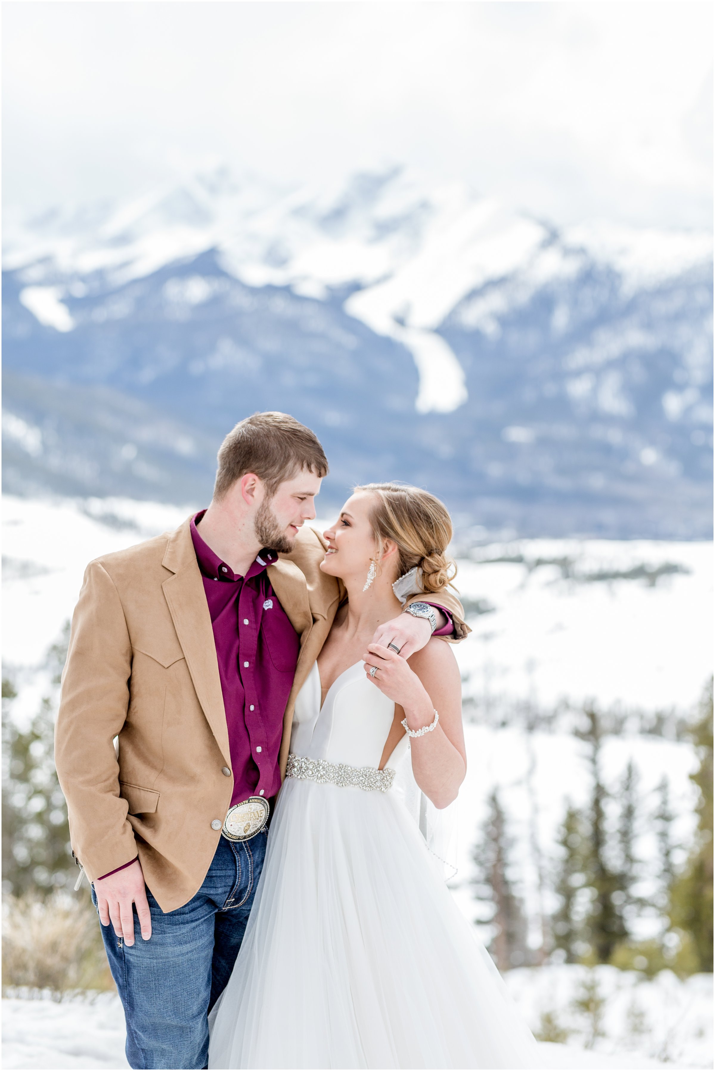 winter wedding in Silverthorne Colorado with snow around Lake Dillon