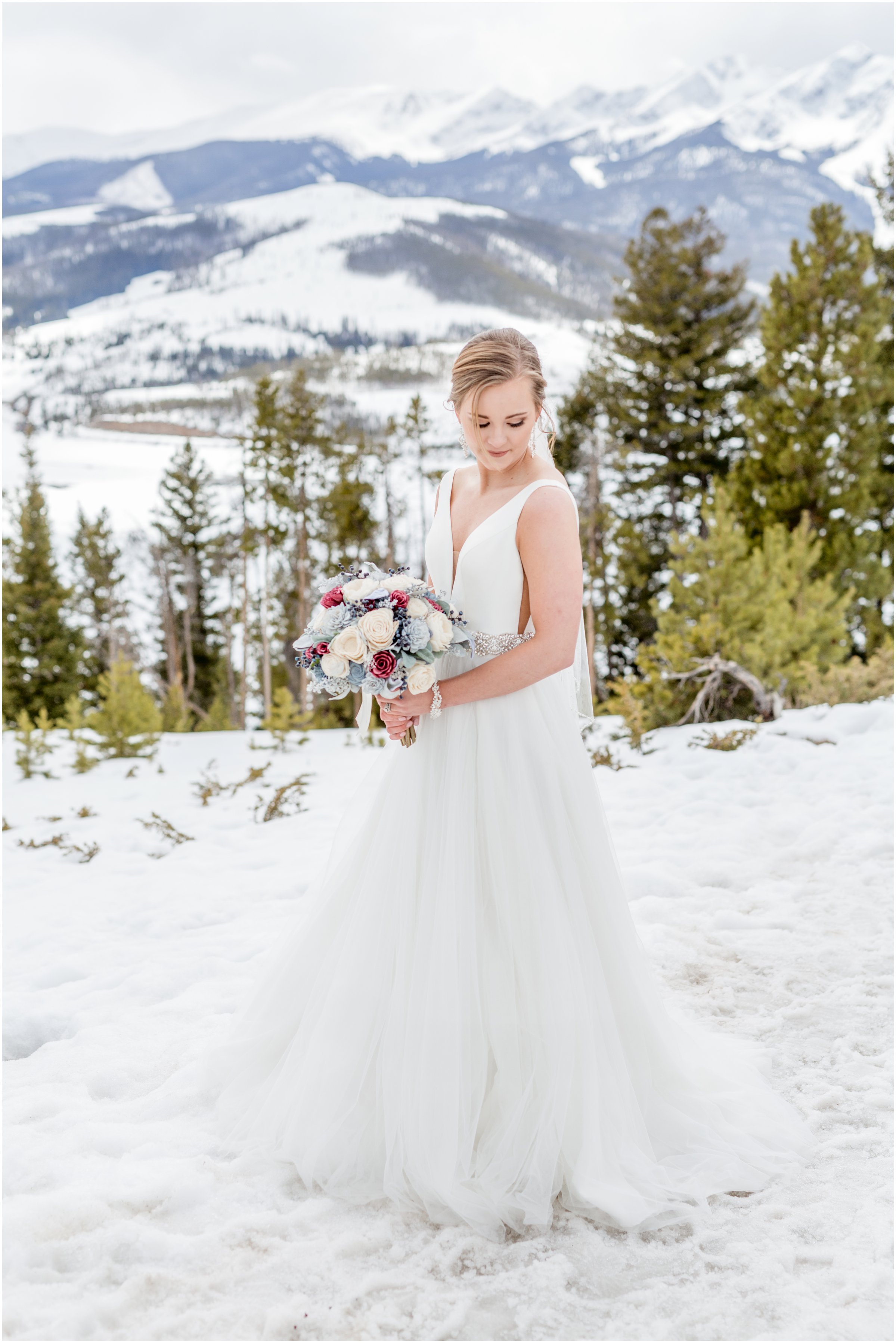 winter wedding in Silverthorne Colorado with snow around Lake Dillon