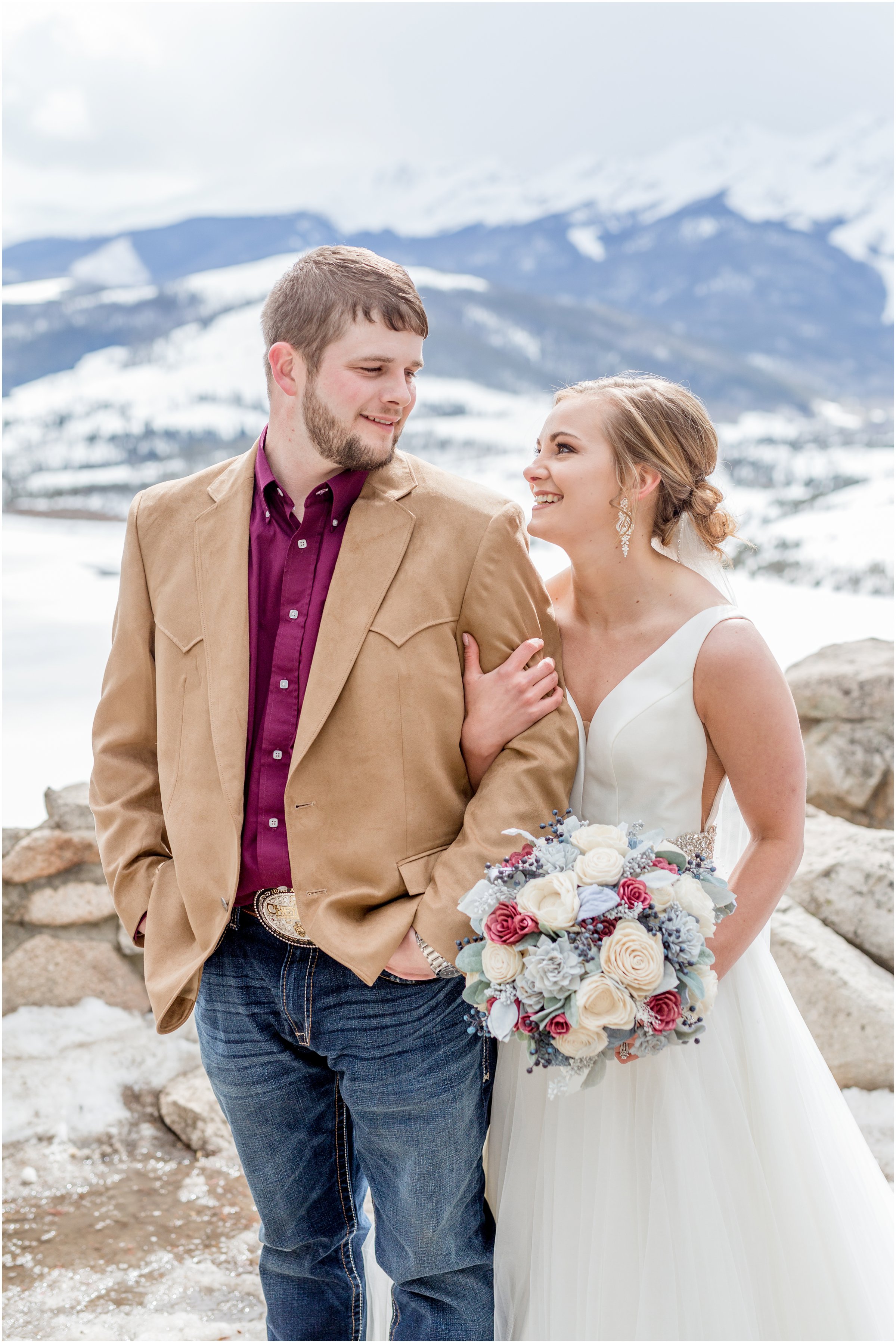 winter wedding in Silverthorne Colorado with snow around Lake Dillon