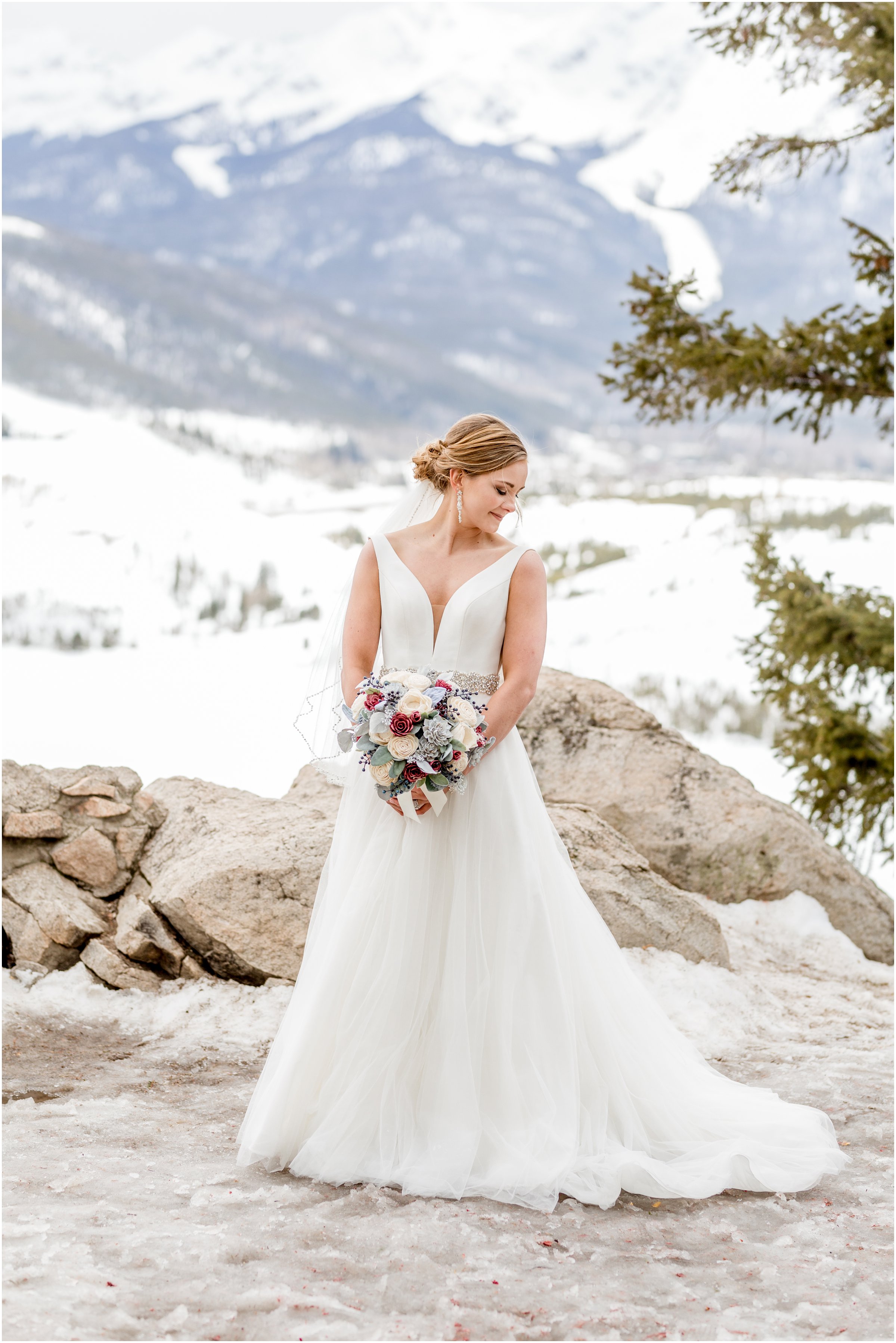 winter wedding in Silverthorne Colorado with snow around Lake Dillon