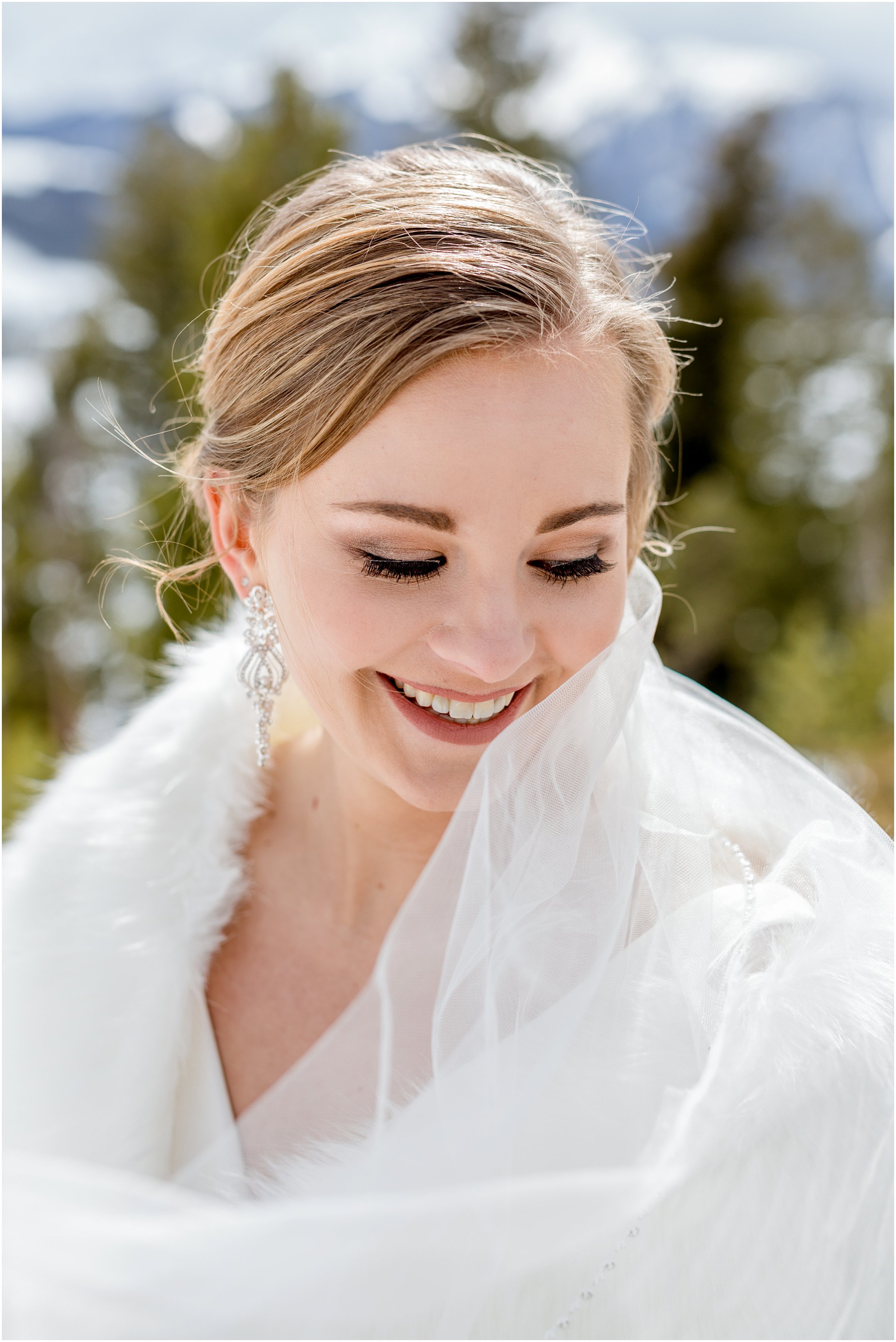 winter wedding in Silverthorne Colorado with snow around Lake Dillon