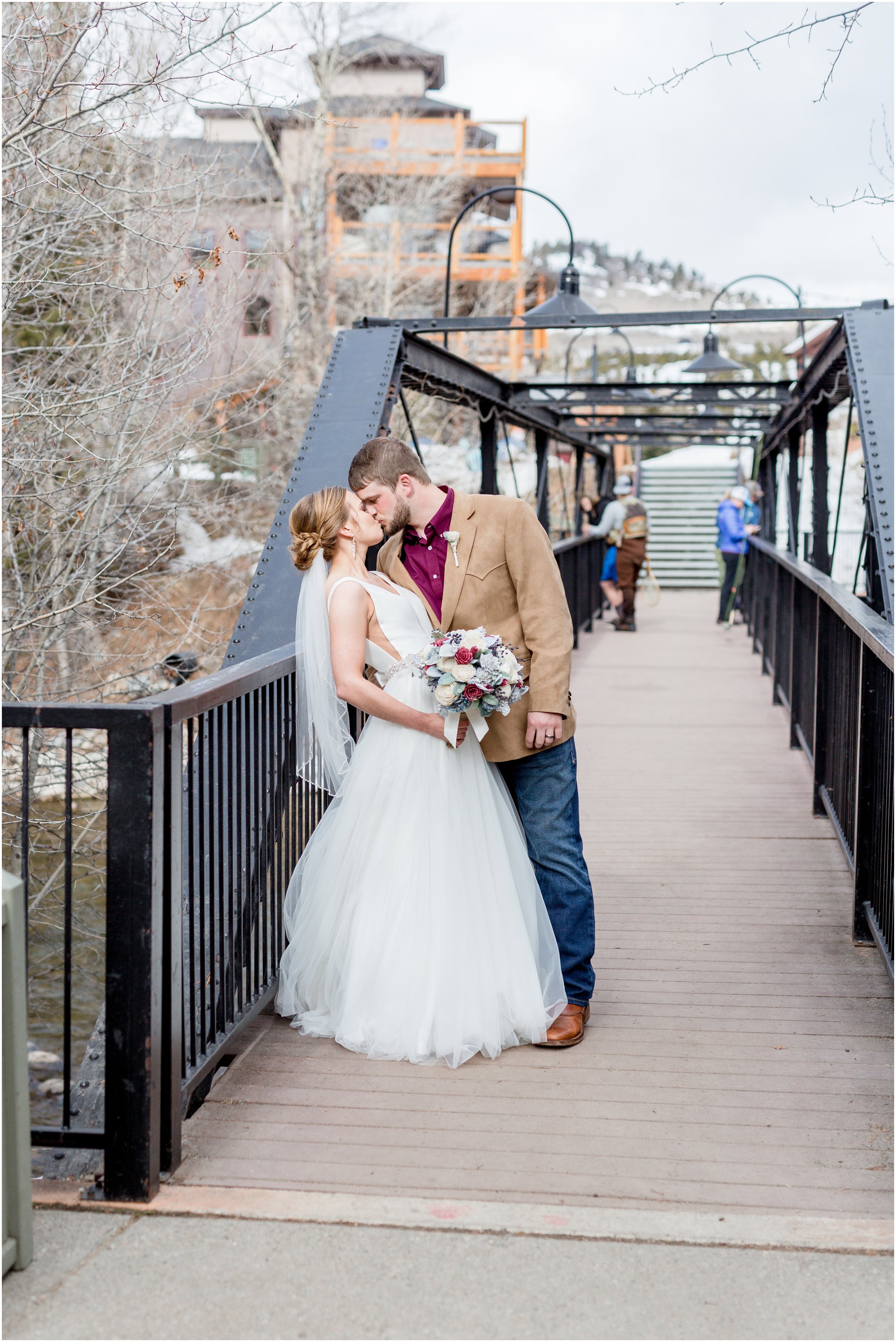 winter wedding in Silverthorne Colorado with snow around Lake Dillon