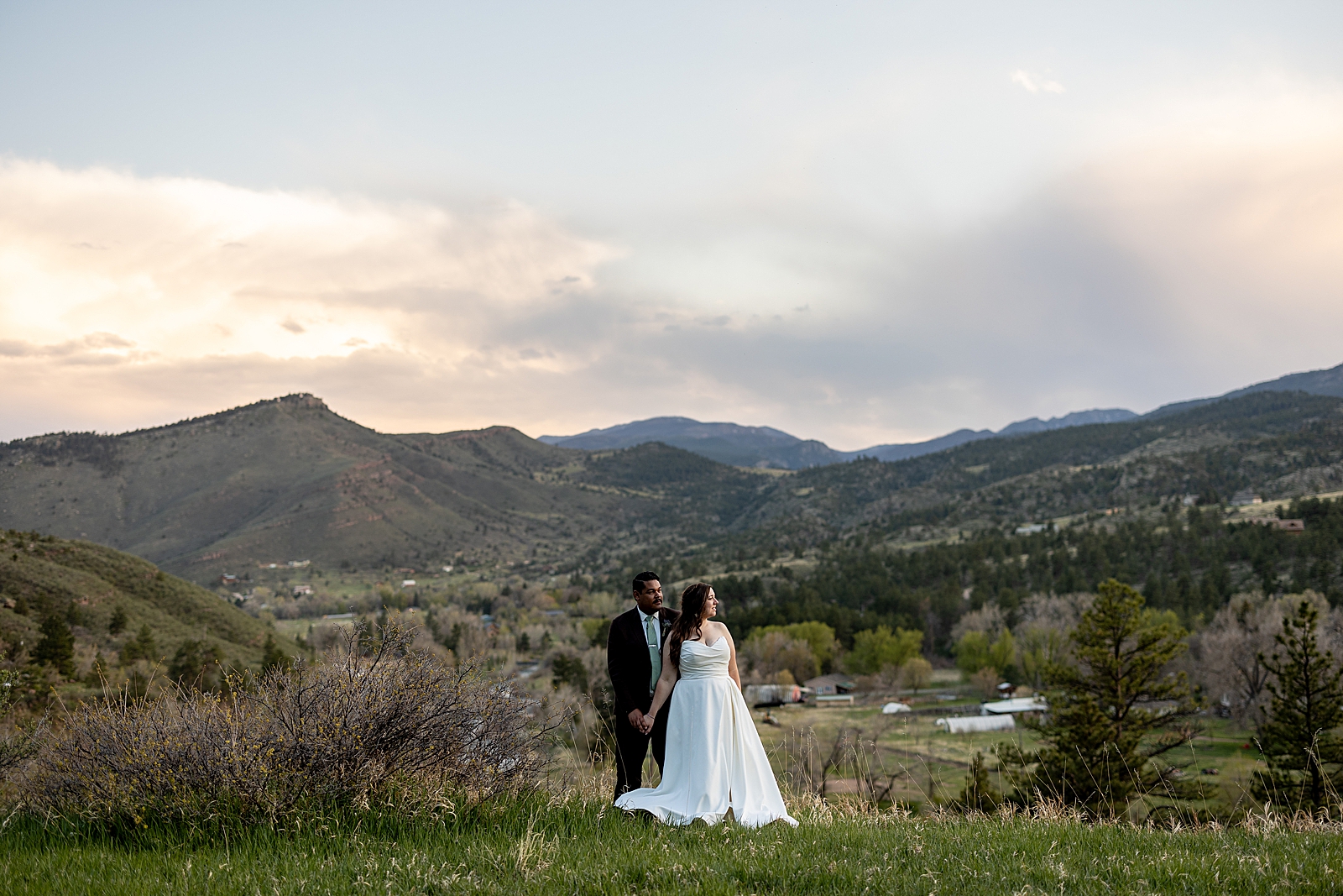 bride and groom on stone mountain at stone mountain lodge near lyons colorado